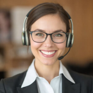 Beautiful assistant wearing eye glasses and a headset. 